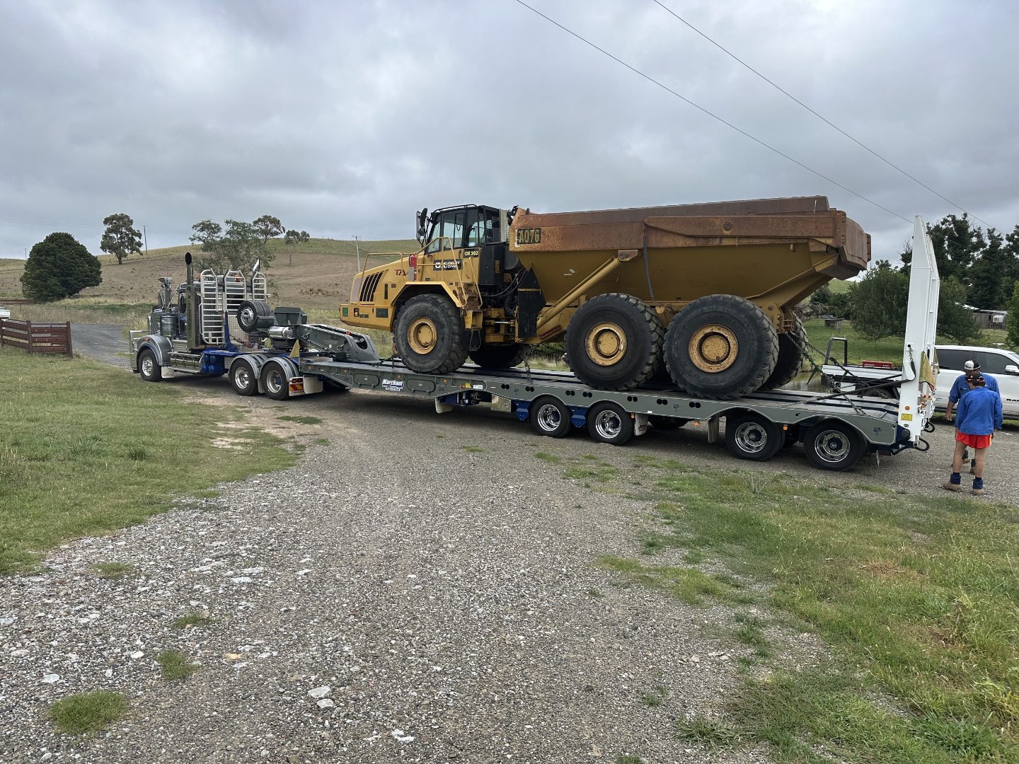 Excavator loading a dump truck