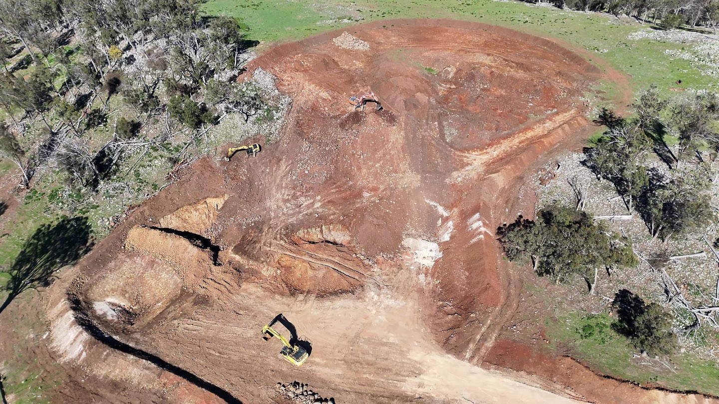 Site overview with excavator