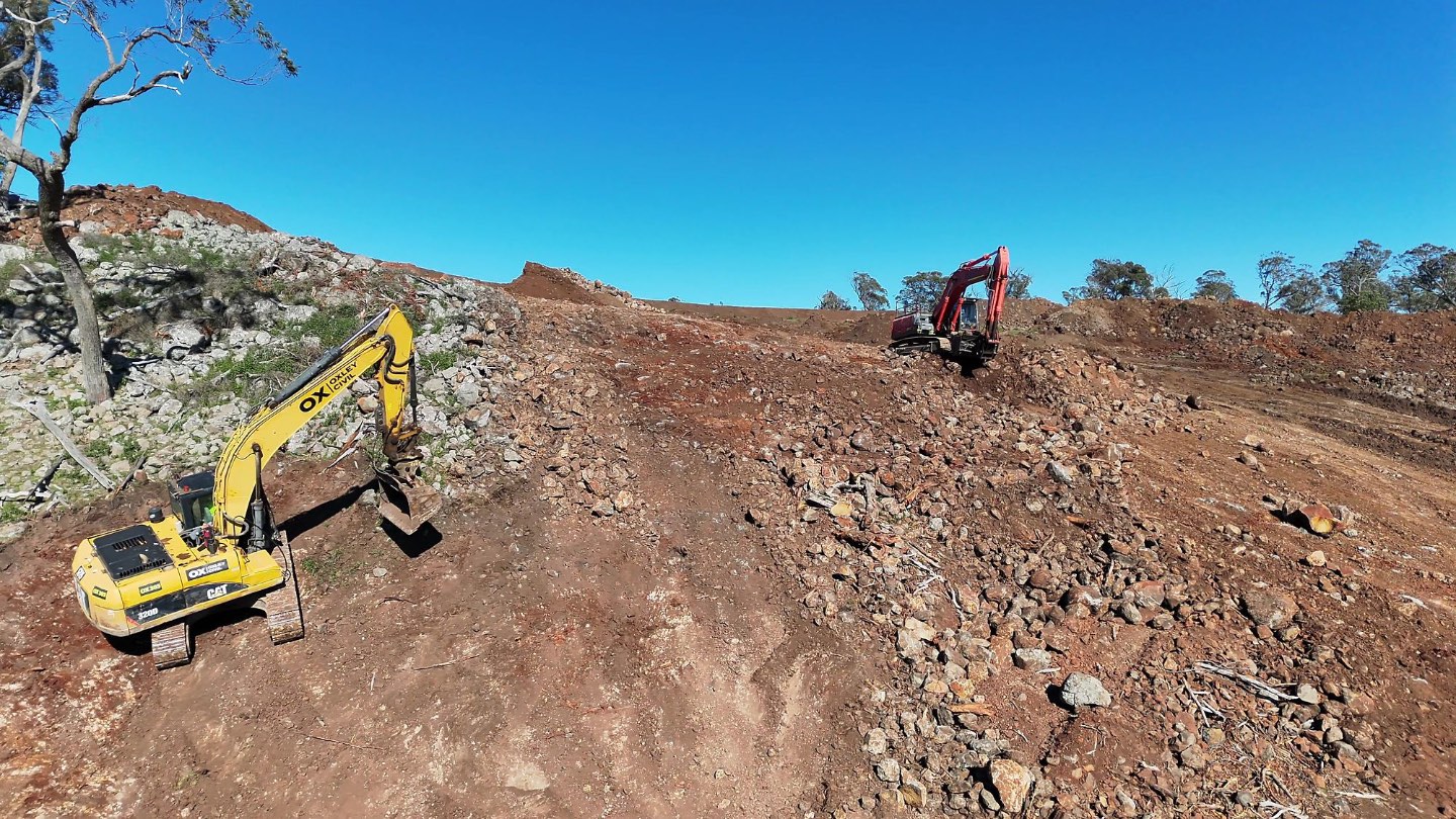 Excavator on a rock slope