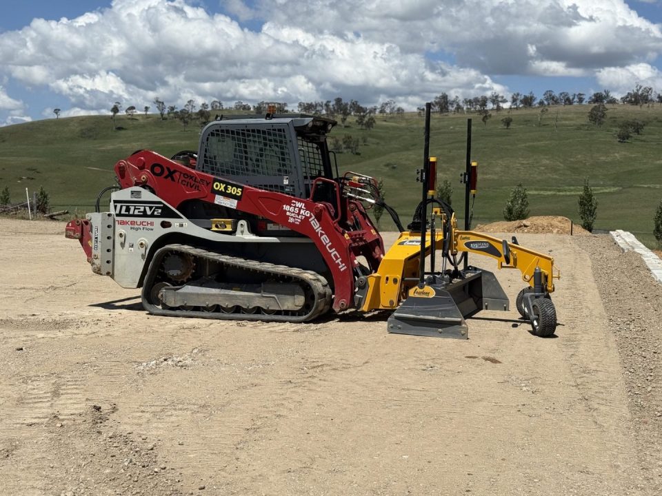 Takeuchi TL12 with laser grading box